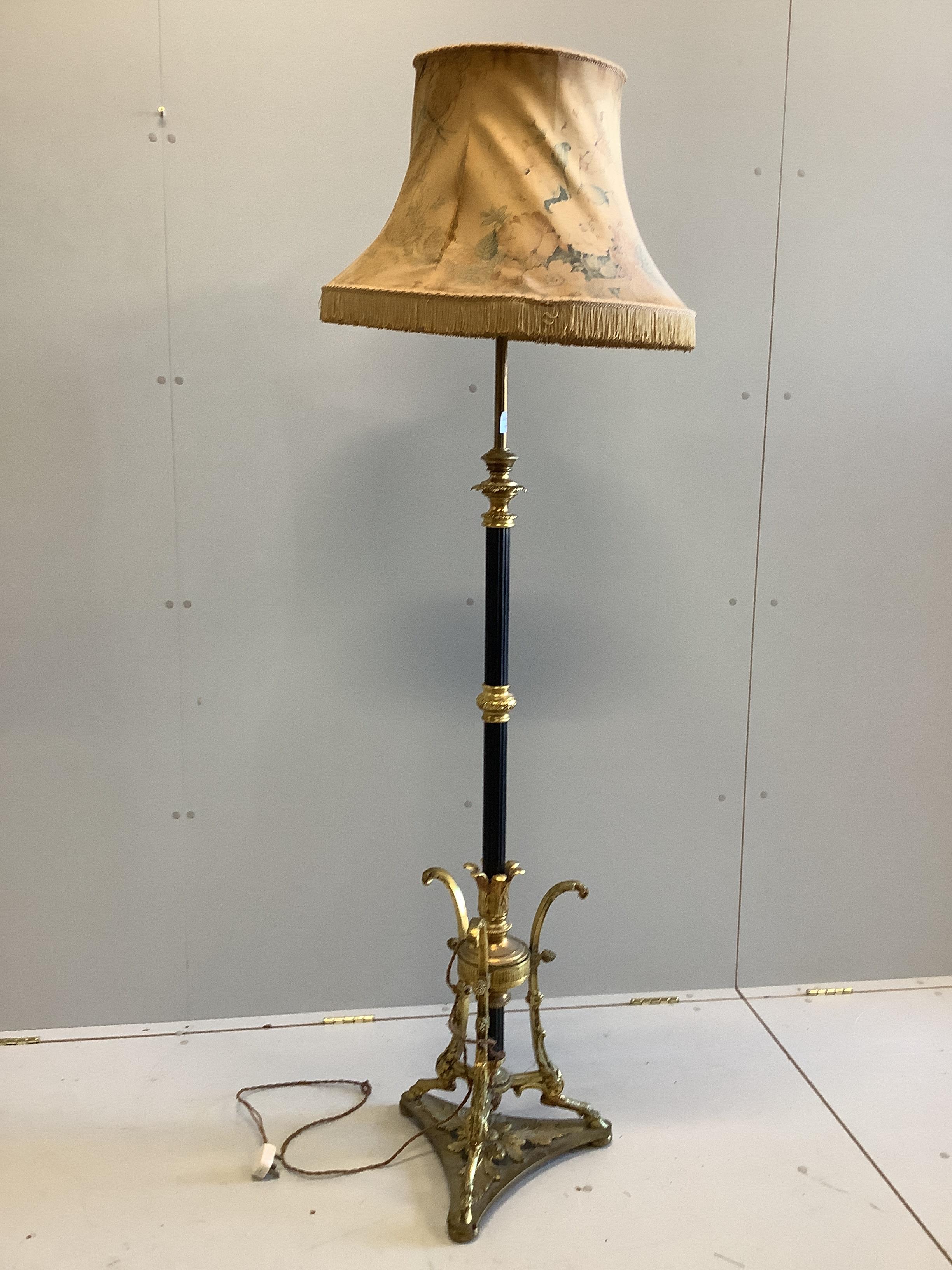 A Victorian gilt brass and black lacquered adjustable lamp standard, height including shade 176cm